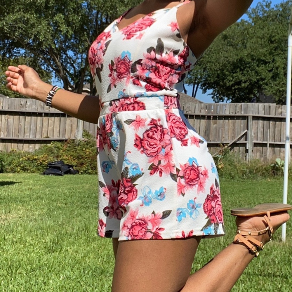 white and pink floral short romper
